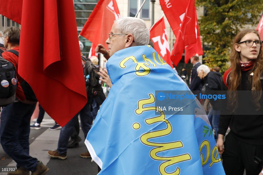 BERLIN, GERMANY, OCTOBER 3, 2026: Thousands of people march through central Berlin during a peace demonstration against military rearmament, compulsory military service and war on German Unity Day. Protesters gathered near the Brandenburg Gate before marching through the city, with trade unions, peace movements, political groups and a pro-Palestinian bloc taking part. Berlin police estimated attendance at around 5,800, while organizers put the number at more than 20,000. Police detained at least two protesters during the demonstration. Photo by Alessia Cocca / JNA Press (Photo by Alessia Cocca/JNA Press via Nexpher Images)