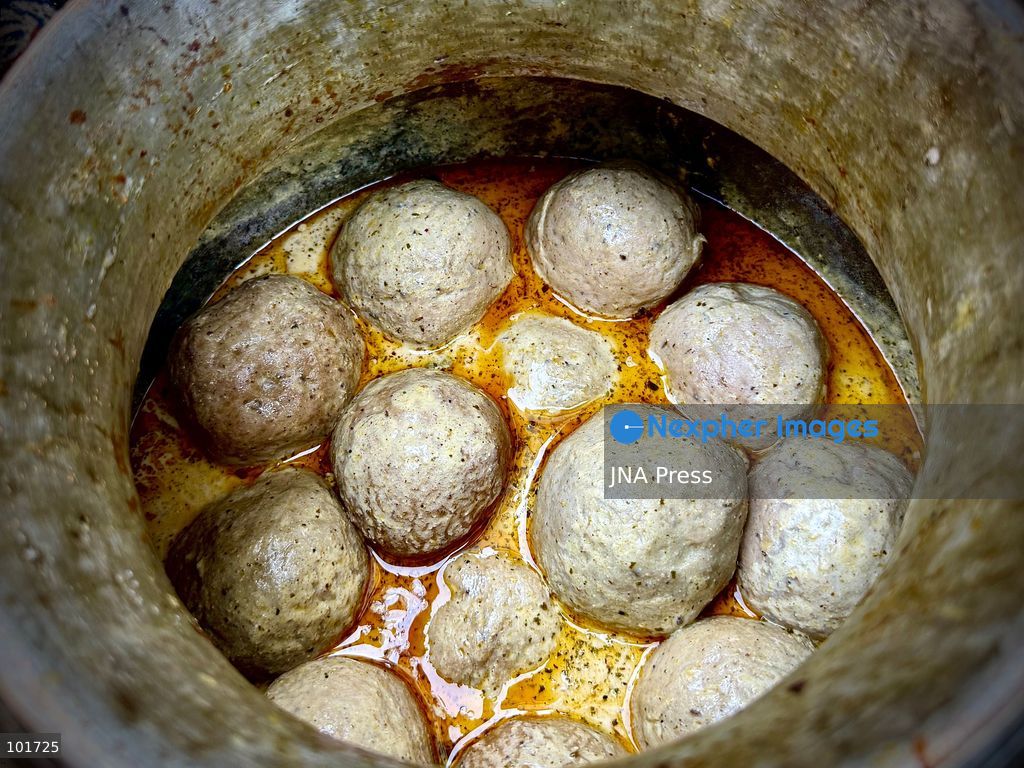 KULGAM, JAMMU AND KASHMIR, INDIA, OCTOBER 4, 2026: Traditional cooks prepare Wazwan, Kashmir's multi-course meat feast, in Kulgam. The elaborate meal remains an important part of Kashmiri weddings and other celebrations, with dishes traditionally prepared by specialist cooks known as wazas. The centuries-old culinary tradition continues to be practiced across Kashmir despite changing lifestyles and modern wedding customs. Photo by Hilal Zargar / JNA Press. (Photo by Hilal Zargar/JNA Press via Nexpher Images)