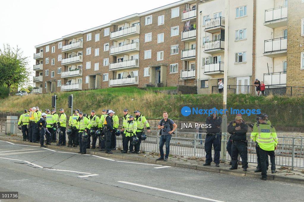 DOVER, UNITED KINGDOM, OCTOBER 3, 2026: Anti-immigration protesters and anti-racism counter-protesters gather during rival demonstrations in Dover, Kent. Anti-immigration demonstrators carrying Union flags and St George's flags displayed banners calling for deportations and an end to small-boat crossings, while counter-protesters gathered nearby. Police maintained a significant presence between the groups and monitored the demonstrations. Photo by Marc Lewis / JNA Press. (Photo by Marc Lewis/JNA Press via Nexpher Images)