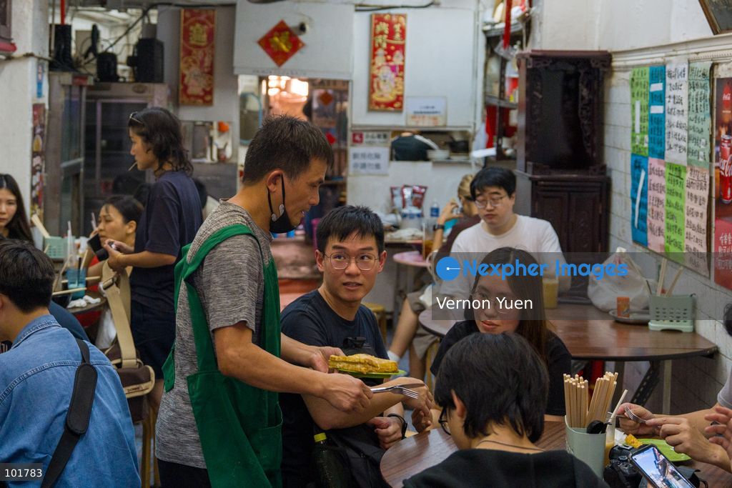 Customers inside Hoi Kee Cafe at Cha Kwo Ling Village on October 4, 2026 in Hong Kong. Two traditional “Bing Sutt” style restaurants at Cha Kwo Ling Village will shut down after today. (Photo by Vernon Yuen/Nexpher Images)