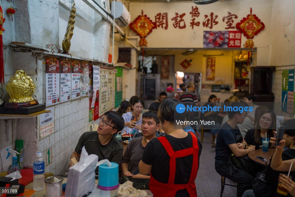 Customers inside Hoi Kee Cafe at Cha Kwo Ling Village on October 4, 2026 in Hong Kong. Two traditional “Bing Sutt” style restaurants at Cha Kwo Ling Village will shut down after today. (Photo by Vernon Yuen/Nexpher Images)