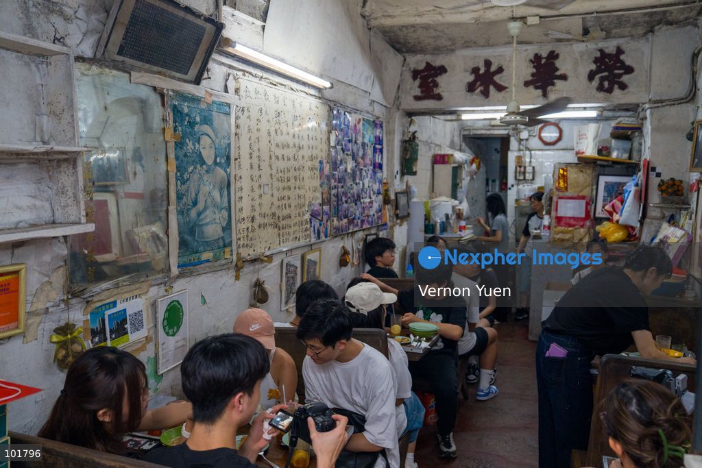 Customers at Wing Wah Cafe at Cha Kwo Ling Village on October 4, 2026 in Hong Kong. Two traditional “Bing Sutt” style restaurants at Cha Kwo Ling Village will shut down after today. (Photo by Vernon Yuen/Nexpher Images)