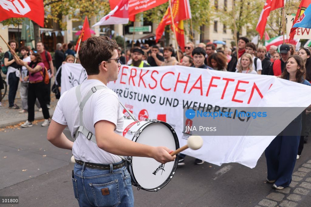 BERLIN, GERMANY, OCTOBER 3, 2026: Thousands of demonstrators march through central Berlin during a protest against Germany's military buildup, increased defense spending and the possible reintroduction of compulsory military service. Protesters called for greater investment in healthcare, housing, education and other social services instead of military spending, while participants also demonstrated against German arms deliveries and support for Israel amid the war in Gaza. The march began at the Brandenburg Gate and continued through central Berlin before returning to the area. Photo by Zaira Bilagini / JNA Press. (Photo by Zaira Biagini/JNA Press via Nexpher Images)