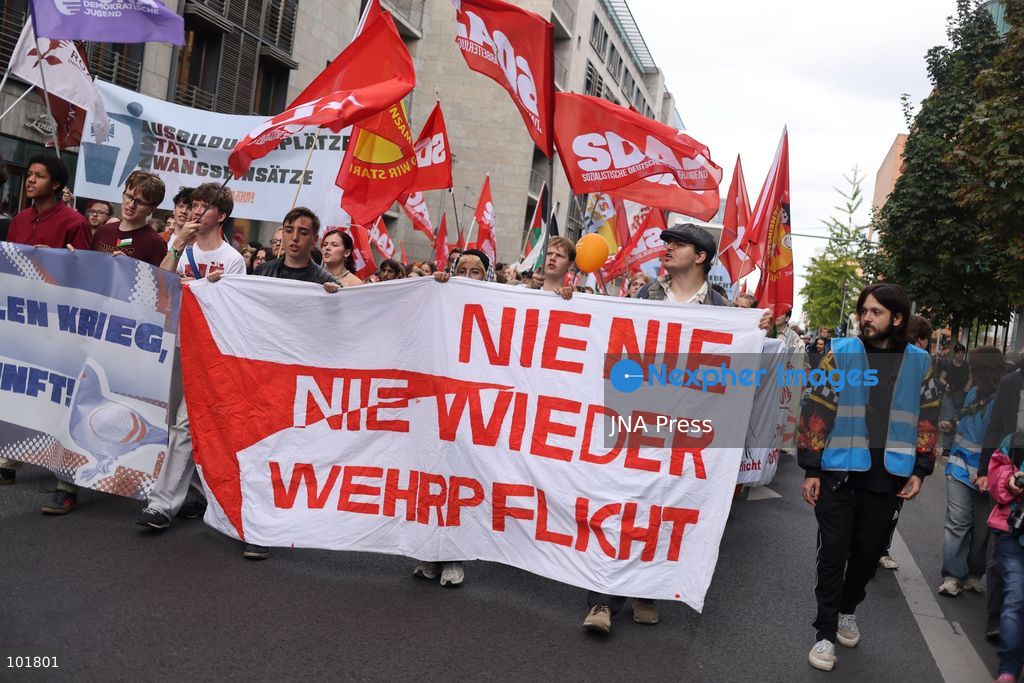 BERLIN, GERMANY, OCTOBER 3, 2026: Thousands of demonstrators march through central Berlin during a protest against Germany's military buildup, increased defense spending and the possible reintroduction of compulsory military service. Protesters called for greater investment in healthcare, housing, education and other social services instead of military spending, while participants also demonstrated against German arms deliveries and support for Israel amid the war in Gaza. The march began at the Brandenburg Gate and continued through central Berlin before returning to the area. Photo by Zaira Bilagini / JNA Press. (Photo by Zaira Biagini/JNA Press via Nexpher Images)