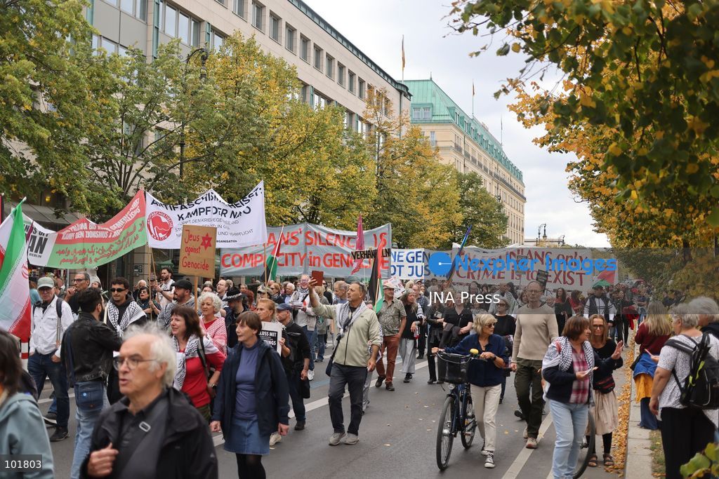 BERLIN, GERMANY, OCTOBER 3, 2026: Thousands of demonstrators march through central Berlin during a protest against Germany's military buildup, increased defense spending and the possible reintroduction of compulsory military service. Protesters called for greater investment in healthcare, housing, education and other social services instead of military spending, while participants also demonstrated against German arms deliveries and support for Israel amid the war in Gaza. The march began at the Brandenburg Gate and continued through central Berlin before returning to the area. Photo by Zaira Bilagini / JNA Press. (Photo by Zaira Biagini/JNA Press via Nexpher Images)