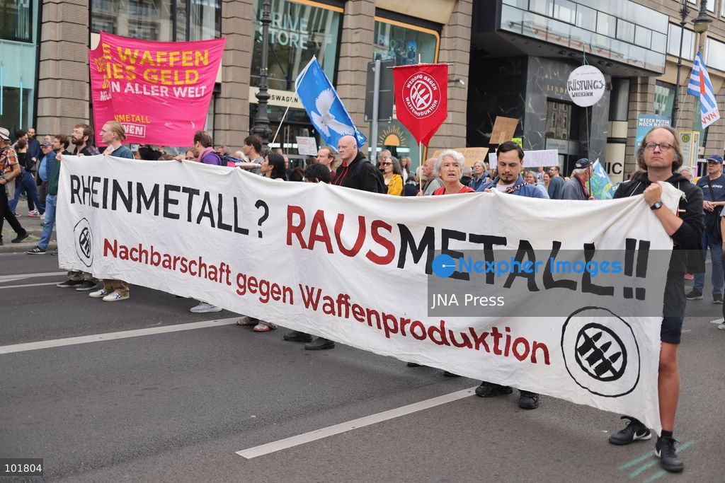 BERLIN, GERMANY, OCTOBER 3, 2026: Thousands of demonstrators march through central Berlin during a protest against Germany's military buildup, increased defense spending and the possible reintroduction of compulsory military service. Protesters called for greater investment in healthcare, housing, education and other social services instead of military spending, while participants also demonstrated against German arms deliveries and support for Israel amid the war in Gaza. The march began at the Brandenburg Gate and continued through central Berlin before returning to the area. Photo by Zaira Bilagini / JNA Press. (Photo by Zaira Biagini/JNA Press via Nexpher Images)