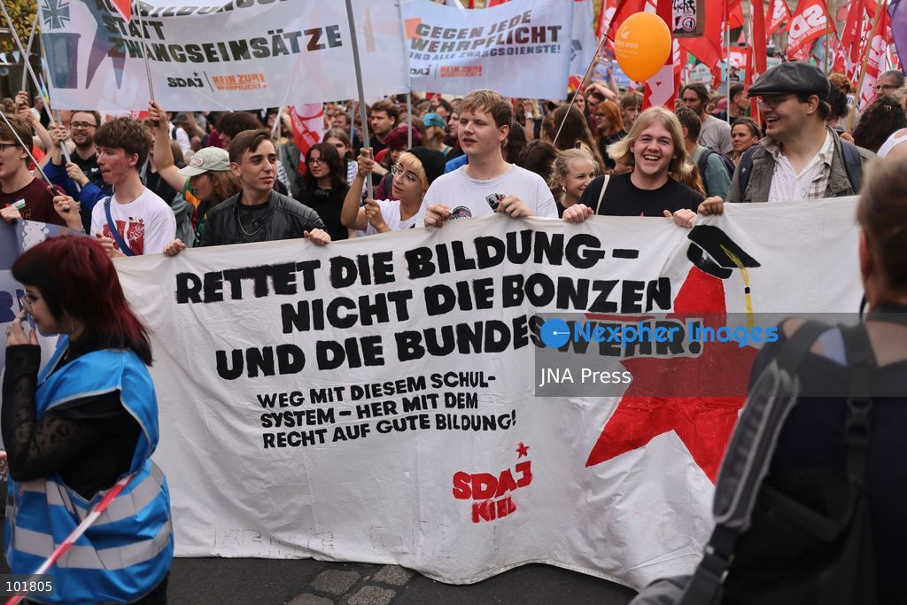 BERLIN, GERMANY, OCTOBER 3, 2026: Thousands of demonstrators march through central Berlin during a protest against Germany's military buildup, increased defense spending and the possible reintroduction of compulsory military service. Protesters called for greater investment in healthcare, housing, education and other social services instead of military spending, while participants also demonstrated against German arms deliveries and support for Israel amid the war in Gaza. The march began at the Brandenburg Gate and continued through central Berlin before returning to the area. Photo by Zaira Bilagini / JNA Press. (Photo by Zaira Biagini/JNA Press via Nexpher Images)