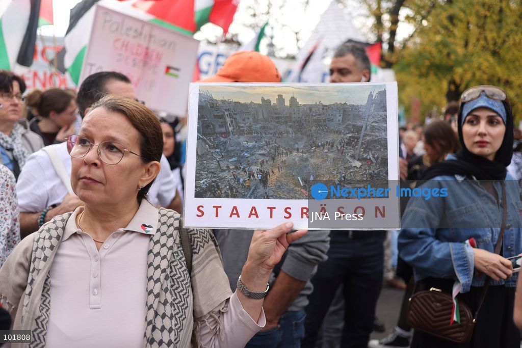 BERLIN, GERMANY, OCTOBER 3, 2026: Thousands of demonstrators march through central Berlin during a protest against Germany's military buildup, increased defense spending and the possible reintroduction of compulsory military service. Protesters called for greater investment in healthcare, housing, education and other social services instead of military spending, while participants also demonstrated against German arms deliveries and support for Israel amid the war in Gaza. The march began at the Brandenburg Gate and continued through central Berlin before returning to the area. Photo by Zaira Bilagini / JNA Press. (Photo by Zaira Biagini/JNA Press via Nexpher Images)