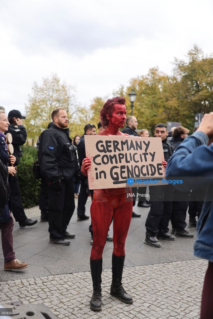 BERLIN, GERMANY, OCTOBER 3, 2026: Thousands of demonstrators march through central Berlin during a protest against Germany's military buildup, increased defense spending and the possible reintroduction of compulsory military service. Protesters called for greater investment in healthcare, housing, education and other social services instead of military spending, while participants also demonstrated against German arms deliveries and support for Israel amid the war in Gaza. The march began at the Brandenburg Gate and continued through central Berlin before returning to the area. Photo by Zaira Bilagini / JNA Press. (Photo by Zaira Biagini/JNA Press via Nexpher Images)