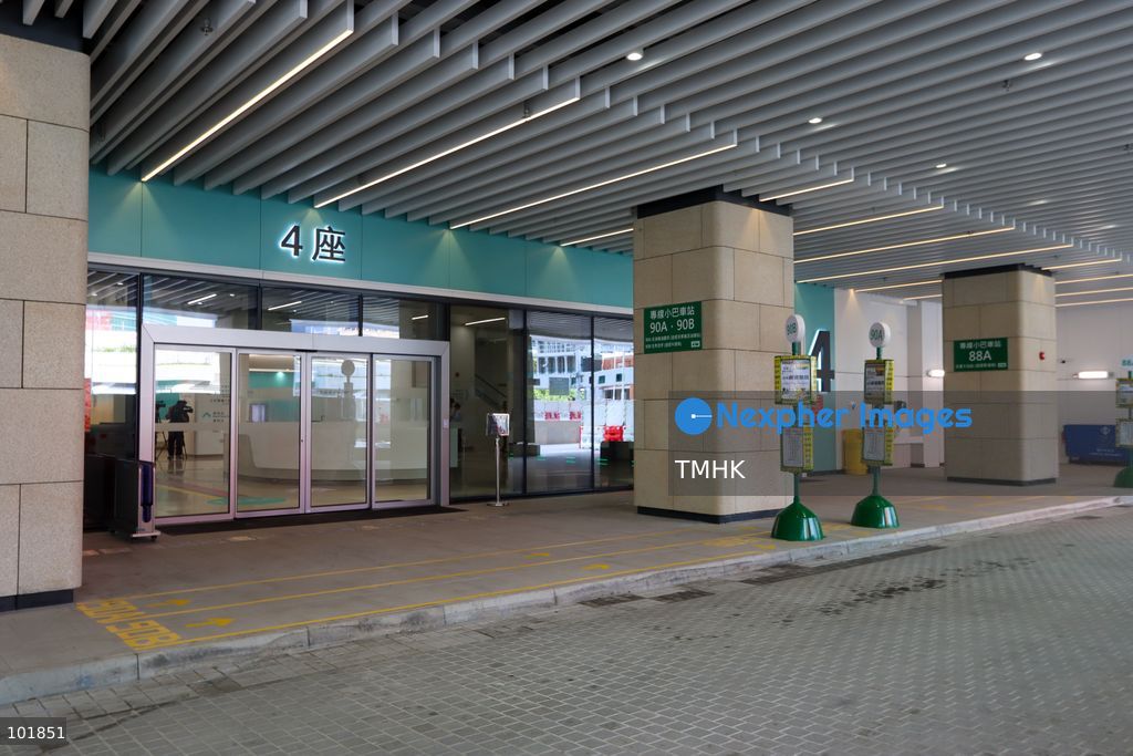 A close-up shot of the official bilingual directory sign and nameplate outside the main entrance of Kai Tak Hospital on October 4, 2026 in Hong Kong, displaying clinic zones, service departments, and navigation guides for visitors and patients ahead of its opening day. (Photo by Gordon Choi/TMHK via Nexpher Images)