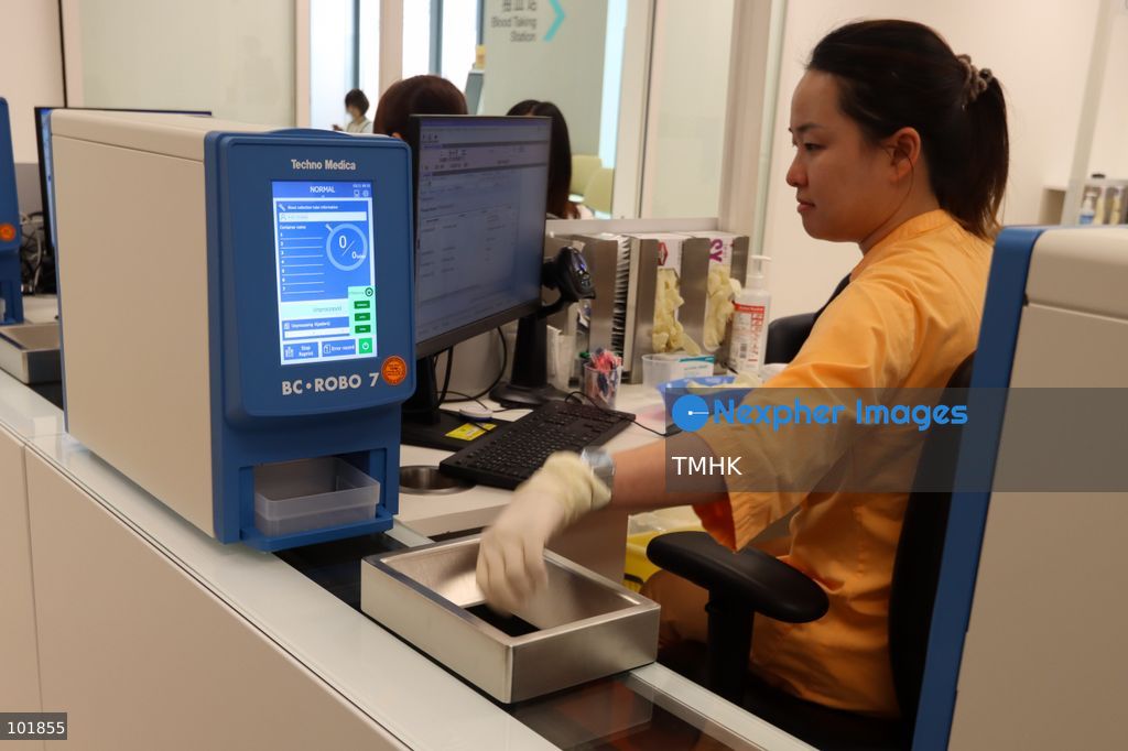 Healthcare staff demonstrate the smart patient registration procedures and consultation workflow inside a newly completed consultation suite at the Specialist Outpatient Block of Kai Tak Hospital during a media demonstration on October 4, 2026 in Hong Kong, ahead of the hospital's official phased commissioning tomorrow. (Photo by Gordon Choi/TMHK via Nexpher Images)