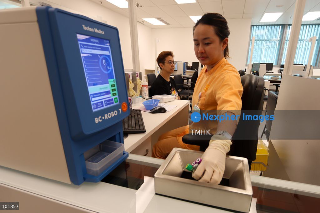 Healthcare staff demonstrate the smart patient registration procedures and consultation workflow inside a newly completed consultation suite at the Specialist Outpatient Block of Kai Tak Hospital during a media demonstration on October 4, 2026 in Hong Kong, ahead of the hospital's official phased commissioning tomorrow. (Photo by Gordon Choi/TMHK via Nexpher Images)