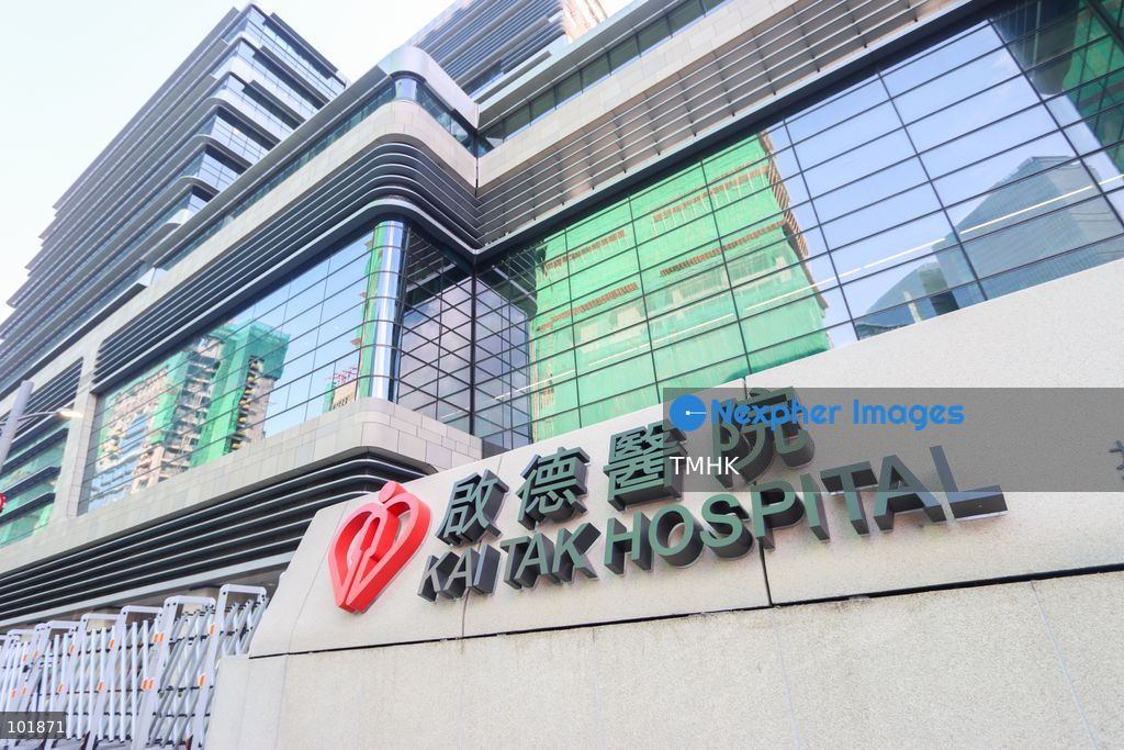 A close-up shot of the official bilingual directory sign and nameplate outside the main entrance of Kai Tak Hospital on October 4, 2026 in Hong Kong, displaying clinic zones, service departments, and navigation guides for visitors and patients ahead of its opening day. (Photo by Gordon Choi/TMHK via Nexpher Images)
