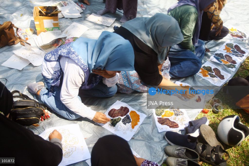 MALANG, EAST JAVA, INDONESIA, OCTOBER 4, 2026: Visitors and artisans take part in National Batik Day celebrations in Malang, featuring batik-making workshops, textile exhibitions and fashion shows showcasing traditional Indonesian designs. Batik is produced using a wax-resist dyeing technique, with patterns traditionally applied using a canting tool. Indonesian batik was inscribed by UNESCO on its Representative List of the Intangible Cultural Heritage of Humanity in 2009. Photo by Hayu Yudha Prabowo / JNA Press. (Photo by Hayu Yudha Prabowo/JNA Press via Nexpher Images)