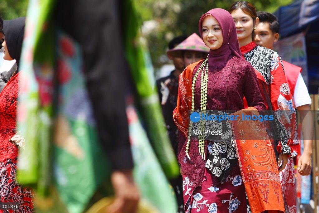 MALANG, EAST JAVA, INDONESIA, OCTOBER 4, 2026: Visitors and artisans take part in National Batik Day celebrations in Malang, featuring batik-making workshops, textile exhibitions and fashion shows showcasing traditional Indonesian designs. Batik is produced using a wax-resist dyeing technique, with patterns traditionally applied using a canting tool. Indonesian batik was inscribed by UNESCO on its Representative List of the Intangible Cultural Heritage of Humanity in 2009. Photo by Hayu Yudha Prabowo / JNA Press. (Photo by Hayu Yudha Prabowo/JNA Press via Nexpher Images)