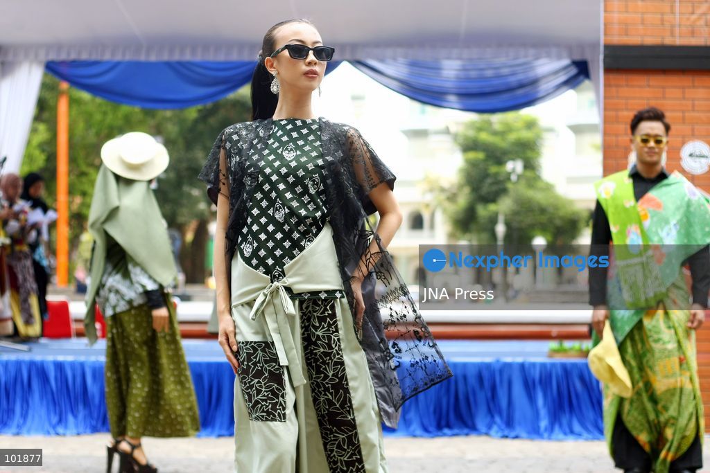 MALANG, EAST JAVA, INDONESIA, OCTOBER 4, 2026: Visitors and artisans take part in National Batik Day celebrations in Malang, featuring batik-making workshops, textile exhibitions and fashion shows showcasing traditional Indonesian designs. Batik is produced using a wax-resist dyeing technique, with patterns traditionally applied using a canting tool. Indonesian batik was inscribed by UNESCO on its Representative List of the Intangible Cultural Heritage of Humanity in 2009. Photo by Hayu Yudha Prabowo / JNA Press. (Photo by Hayu Yudha Prabowo/JNA Press via Nexpher Images)