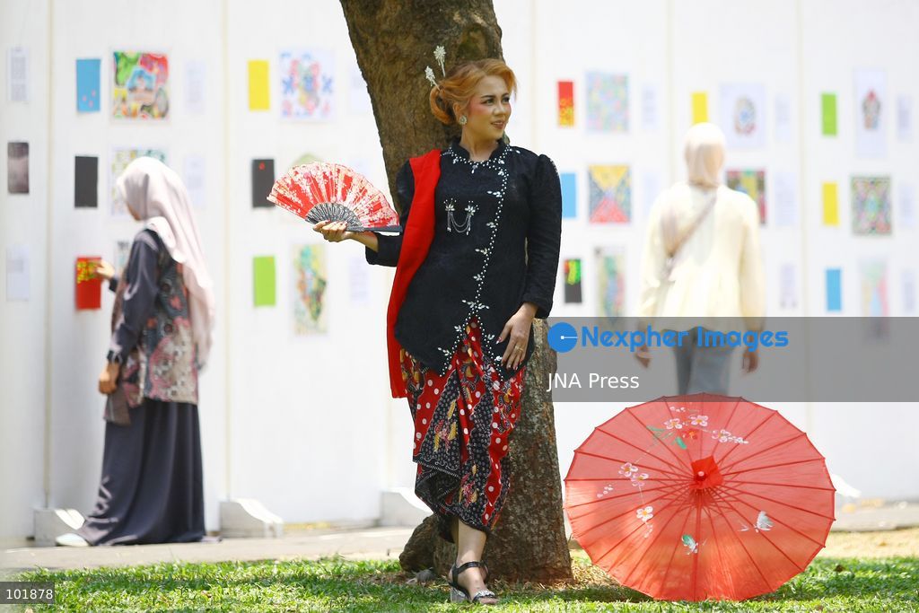 MALANG, EAST JAVA, INDONESIA, OCTOBER 4, 2026: Visitors and artisans take part in National Batik Day celebrations in Malang, featuring batik-making workshops, textile exhibitions and fashion shows showcasing traditional Indonesian designs. Batik is produced using a wax-resist dyeing technique, with patterns traditionally applied using a canting tool. Indonesian batik was inscribed by UNESCO on its Representative List of the Intangible Cultural Heritage of Humanity in 2009. Photo by Hayu Yudha Prabowo / JNA Press. (Photo by Hayu Yudha Prabowo/JNA Press via Nexpher Images)
