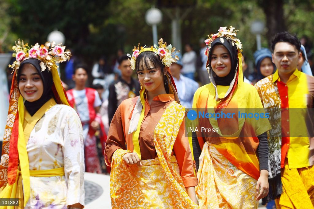 MALANG, EAST JAVA, INDONESIA, OCTOBER 4, 2026: Visitors and artisans take part in National Batik Day celebrations in Malang, featuring batik-making workshops, textile exhibitions and fashion shows showcasing traditional Indonesian designs. Batik is produced using a wax-resist dyeing technique, with patterns traditionally applied using a canting tool. Indonesian batik was inscribed by UNESCO on its Representative List of the Intangible Cultural Heritage of Humanity in 2009. Photo by Hayu Yudha Prabowo / JNA Press. (Photo by Hayu Yudha Prabowo/JNA Press via Nexpher Images)