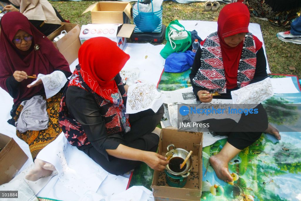 MALANG, EAST JAVA, INDONESIA, OCTOBER 4, 2026: Visitors and artisans take part in National Batik Day celebrations in Malang, featuring batik-making workshops, textile exhibitions and fashion shows showcasing traditional Indonesian designs. Batik is produced using a wax-resist dyeing technique, with patterns traditionally applied using a canting tool. Indonesian batik was inscribed by UNESCO on its Representative List of the Intangible Cultural Heritage of Humanity in 2009. Photo by Hayu Yudha Prabowo / JNA Press. (Photo by Hayu Yudha Prabowo/JNA Press via Nexpher Images)
