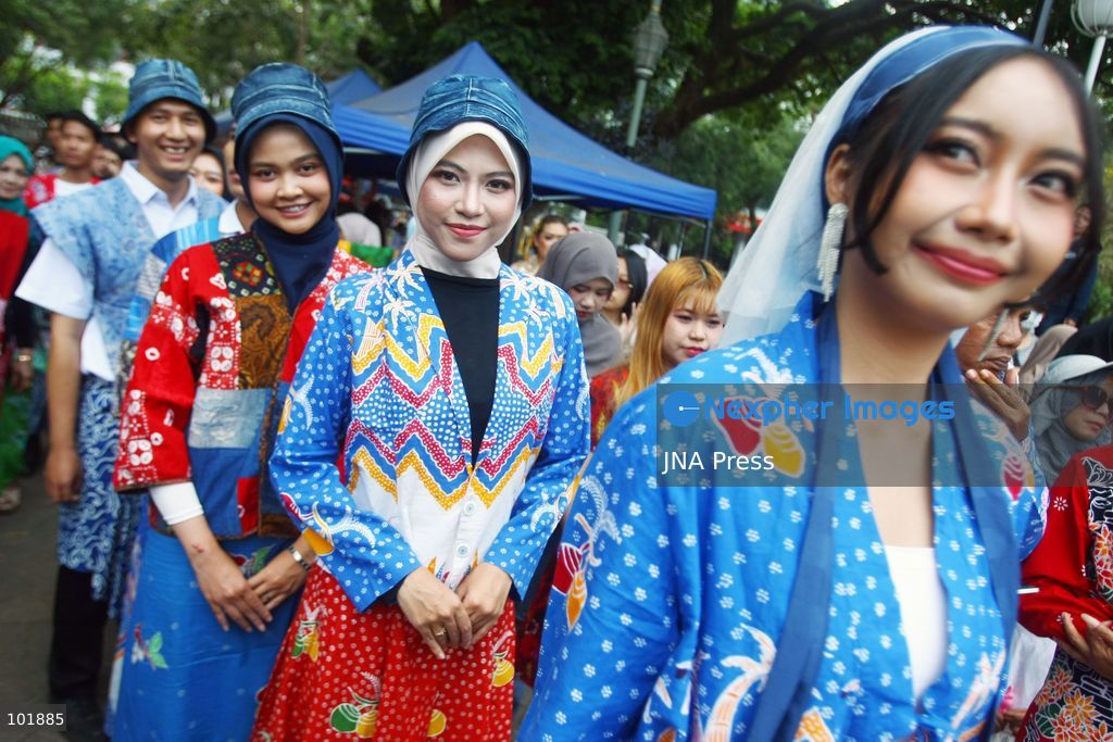 MALANG, EAST JAVA, INDONESIA, OCTOBER 4, 2026: Visitors and artisans take part in National Batik Day celebrations in Malang, featuring batik-making workshops, textile exhibitions and fashion shows showcasing traditional Indonesian designs. Batik is produced using a wax-resist dyeing technique, with patterns traditionally applied using a canting tool. Indonesian batik was inscribed by UNESCO on its Representative List of the Intangible Cultural Heritage of Humanity in 2009. Photo by Hayu Yudha Prabowo / JNA Press. (Photo by Hayu Yudha Prabowo/JNA Press via Nexpher Images)
