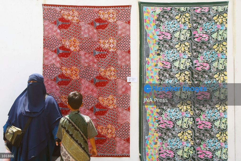 MALANG, EAST JAVA, INDONESIA, OCTOBER 4, 2026: Visitors and artisans take part in National Batik Day celebrations in Malang, featuring batik-making workshops, textile exhibitions and fashion shows showcasing traditional Indonesian designs. Batik is produced using a wax-resist dyeing technique, with patterns traditionally applied using a canting tool. Indonesian batik was inscribed by UNESCO on its Representative List of the Intangible Cultural Heritage of Humanity in 2009. Photo by Hayu Yudha Prabowo / JNA Press. (Photo by Hayu Yudha Prabowo/JNA Press via Nexpher Images)