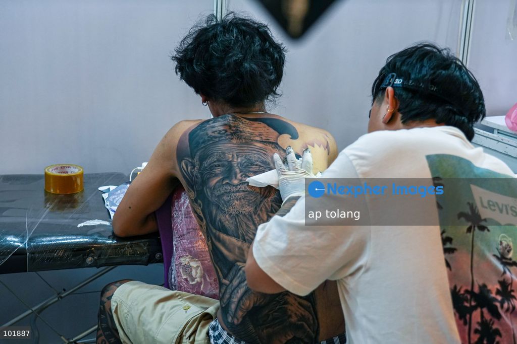 LALITPUR, NEPAL, October 4, 2026: A tattoo artist tattoos a customer during the Himalayan Tattoo Summit 0.3 at Majestic Grand in Lalitpur, Nepal. The summit brings together more than 200 tattoo artists, over 100 studios, and industry professionals from around the world to celebrate tattoo culture, heritage, creativity, and lifestyle. (Photo by ap tolang/Nexpher Images)