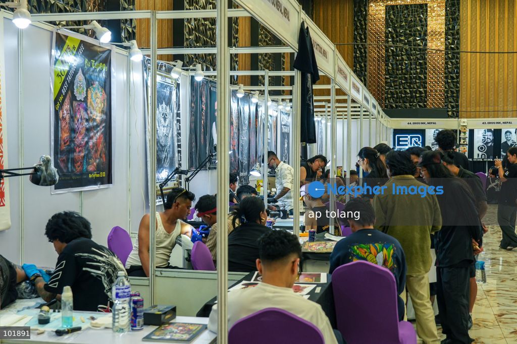 LALITPUR, NEPAL, October 4, 2026: A tattoo artist tattoos a customer during the Himalayan Tattoo Summit 0.3 at Majestic Grand in Lalitpur, Nepal. The summit brings together more than 200 tattoo artists, over 100 studios, and industry professionals from around the world to celebrate tattoo culture, heritage, creativity, and lifestyle. (Photo by ap tolang/Nexpher Images)