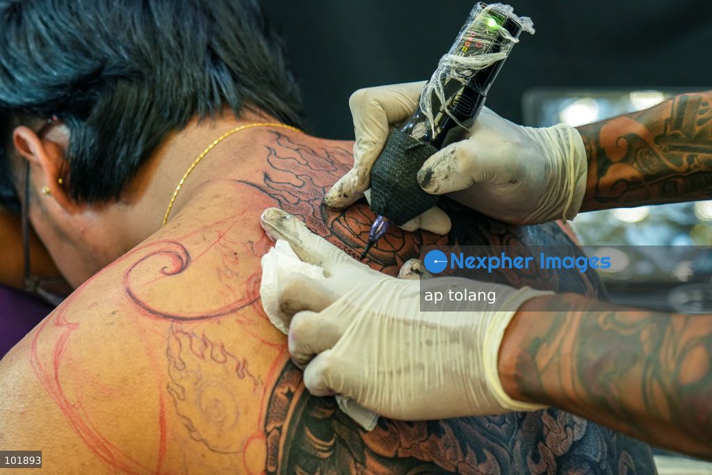 LALITPUR, NEPAL, October 4, 2026: A tattoo artist tattoos a customer during the Himalayan Tattoo Summit 0.3 at Majestic Grand in Lalitpur, Nepal. The summit brings together more than 200 tattoo artists, over 100 studios, and industry professionals from around the world to celebrate tattoo culture, heritage, creativity, and lifestyle. (Photo by ap tolang/Nexpher Images)