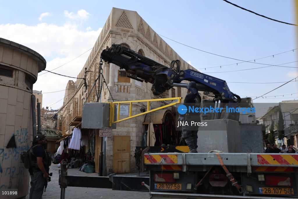 HEBRON, OCCUPIED WEST BANK, OCTOBER 4, 2026: Newly installed Israeli military gates are seen near entrances to Hebron's Old City as Israeli forces impose additional movement restrictions in the area. One of the new iron gates was installed in the Al-Zahid area, a key route connecting neighborhoods of the Old City and providing access toward the Ibrahimi Mosque. Local shop owner Badr al-Tamimi said the restrictions were affecting access to more than 1,000 commercial shops and over 500 homes in the area. Photo by Mosab Shawer / JNA Press. (Photo by Mosab shawer/JNA Press via Nexpher Images)