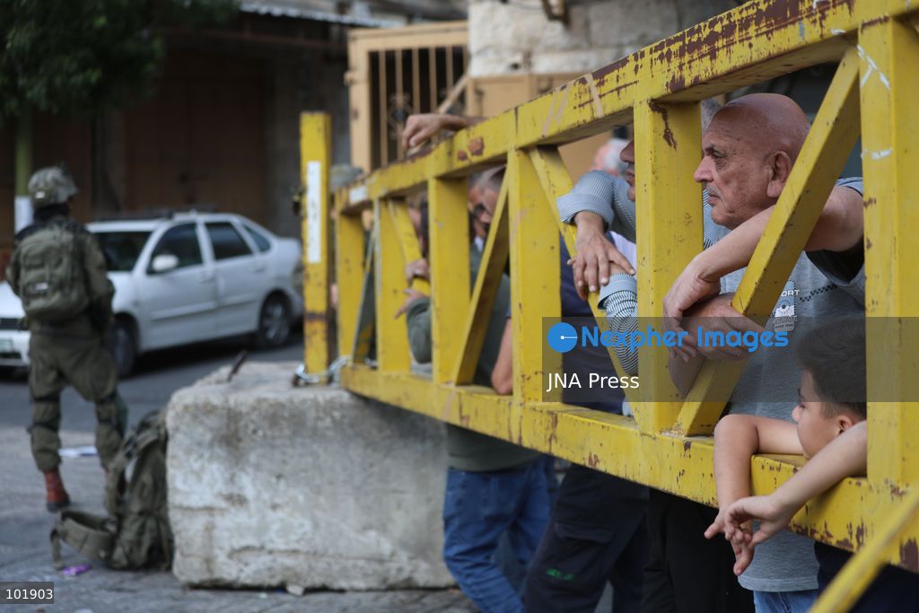 HEBRON, OCCUPIED WEST BANK, OCTOBER 4, 2026: Newly installed Israeli military gates are seen near entrances to Hebron's Old City as Israeli forces impose additional movement restrictions in the area. One of the new iron gates was installed in the Al-Zahid area, a key route connecting neighborhoods of the Old City and providing access toward the Ibrahimi Mosque. Local shop owner Badr al-Tamimi said the restrictions were affecting access to more than 1,000 commercial shops and over 500 homes in the area. Photo by Mosab Shawer / JNA Press. (Photo by Mosab shawer/JNA Press via Nexpher Images)
