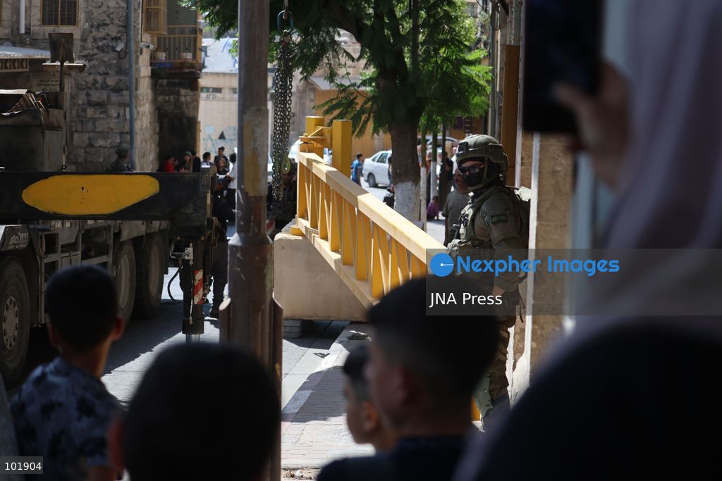 HEBRON, OCCUPIED WEST BANK, OCTOBER 4, 2026: Newly installed Israeli military gates are seen near entrances to Hebron's Old City as Israeli forces impose additional movement restrictions in the area. One of the new iron gates was installed in the Al-Zahid area, a key route connecting neighborhoods of the Old City and providing access toward the Ibrahimi Mosque. Local shop owner Badr al-Tamimi said the restrictions were affecting access to more than 1,000 commercial shops and over 500 homes in the area. Photo by Mosab Shawer / JNA Press. (Photo by Mosab shawer/JNA Press via Nexpher Images)