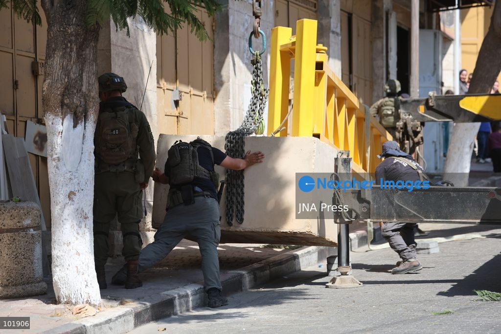 HEBRON, OCCUPIED WEST BANK, OCTOBER 4, 2026: Newly installed Israeli military gates are seen near entrances to Hebron's Old City as Israeli forces impose additional movement restrictions in the area. One of the new iron gates was installed in the Al-Zahid area, a key route connecting neighborhoods of the Old City and providing access toward the Ibrahimi Mosque. Local shop owner Badr al-Tamimi said the restrictions were affecting access to more than 1,000 commercial shops and over 500 homes in the area. Photo by Mosab Shawer / JNA Press. (Photo by Mosab shawer/JNA Press via Nexpher Images)