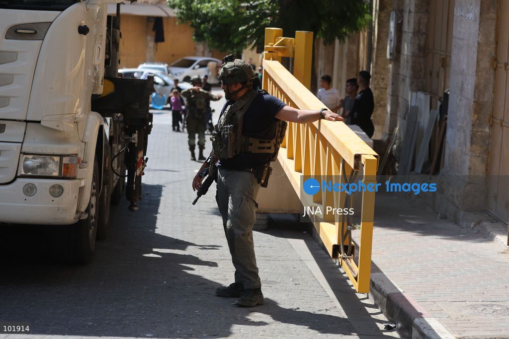 HEBRON, OCCUPIED WEST BANK, OCTOBER 4, 2026: Newly installed Israeli military gates are seen near entrances to Hebron's Old City as Israeli forces impose additional movement restrictions in the area. One of the new iron gates was installed in the Al-Zahid area, a key route connecting neighborhoods of the Old City and providing access toward the Ibrahimi Mosque. Local shop owner Badr al-Tamimi said the restrictions were affecting access to more than 1,000 commercial shops and over 500 homes in the area. Photo by Mosab Shawer / JNA Press. (Photo by Mosab shawer/JNA Press via Nexpher Images)