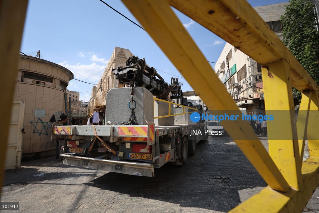 HEBRON, OCCUPIED WEST BANK, OCTOBER 4, 2026: Newly installed Israeli military gates are seen near entrances to Hebron's Old City as Israeli forces impose additional movement restrictions in the area. One of the new iron gates was installed in the Al-Zahid area, a key route connecting neighborhoods of the Old City and providing access toward the Ibrahimi Mosque. Local shop owner Badr al-Tamimi said the restrictions were affecting access to more than 1,000 commercial shops and over 500 homes in the area. Photo by Mosab Shawer / JNA Press. (Photo by Mosab shawer/JNA Press via Nexpher Images)