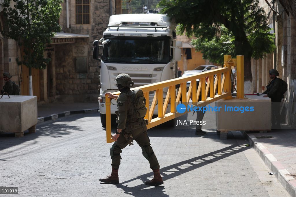 HEBRON, OCCUPIED WEST BANK, OCTOBER 4, 2026: Newly installed Israeli military gates are seen near entrances to Hebron's Old City as Israeli forces impose additional movement restrictions in the area. One of the new iron gates was installed in the Al-Zahid area, a key route connecting neighborhoods of the Old City and providing access toward the Ibrahimi Mosque. Local shop owner Badr al-Tamimi said the restrictions were affecting access to more than 1,000 commercial shops and over 500 homes in the area. Photo by Mosab Shawer / JNA Press. (Photo by Mosab shawer/JNA Press via Nexpher Images)