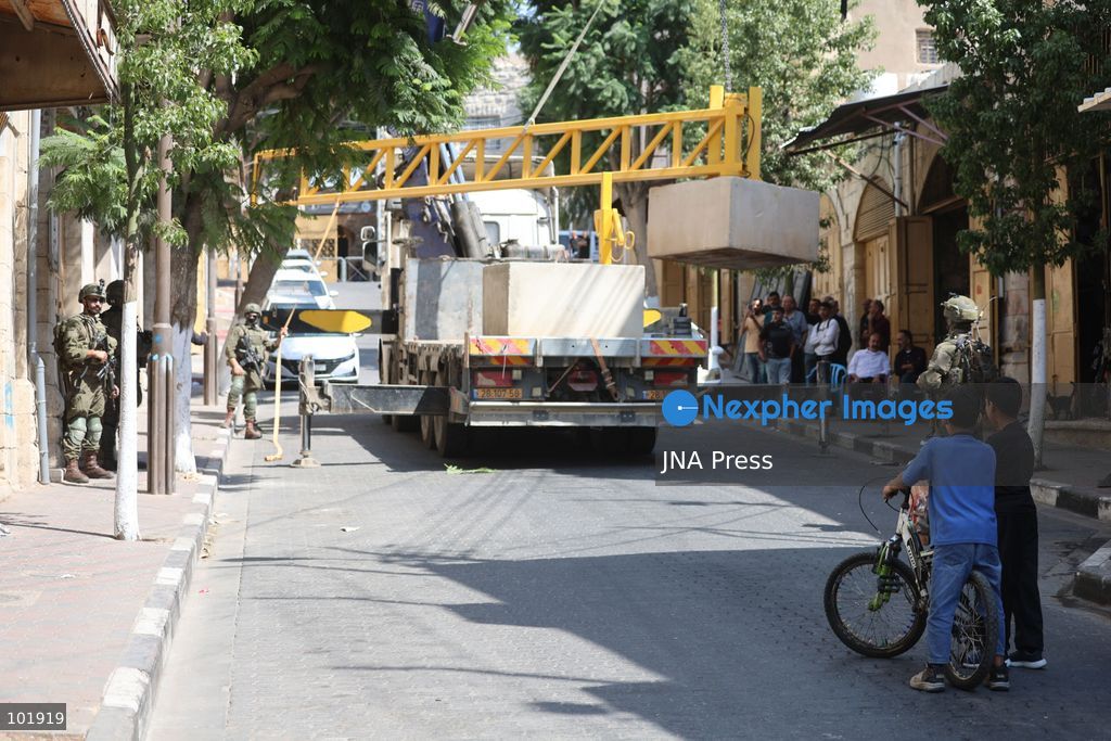 HEBRON, OCCUPIED WEST BANK, OCTOBER 4, 2026: Newly installed Israeli military gates are seen near entrances to Hebron's Old City as Israeli forces impose additional movement restrictions in the area. One of the new iron gates was installed in the Al-Zahid area, a key route connecting neighborhoods of the Old City and providing access toward the Ibrahimi Mosque. Local shop owner Badr al-Tamimi said the restrictions were affecting access to more than 1,000 commercial shops and over 500 homes in the area. Photo by Mosab Shawer / JNA Press. (Photo by Mosab shawer/JNA Press via Nexpher Images)