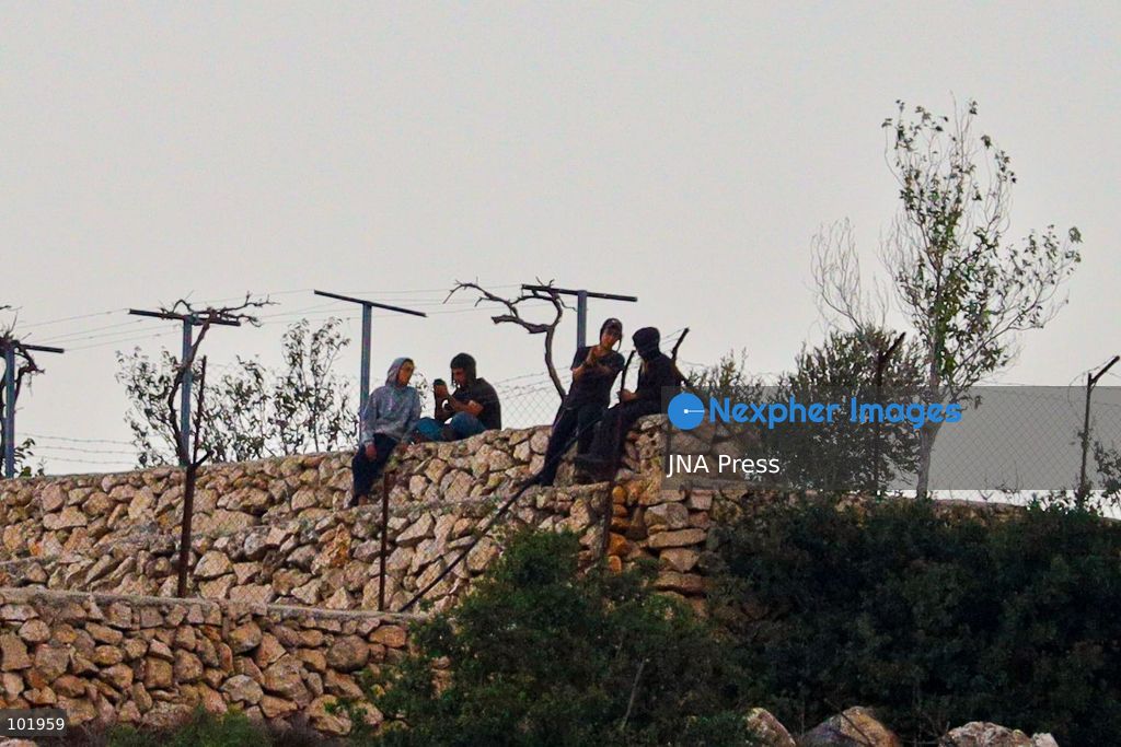 SILWAD, WEST BANK, PALESTINE – OCTOBER 4, 2026: Israeli settlers set fire to olive trees and a car scrap yard between the villages of Ein Yabrud and Silwad, according to the information provided. The owner of the repair shop said more than 50 cars were destroyed in the fire. The incident occurred amid ongoing attacks targeting Palestinian property and agricultural land in the area. Fires affecting olive trees and other Palestinian property have also been reported in areas around Silwad. Photo by Salman Mohsen Alkhatib / JNA Press (Photo by Salman Mohsen Alkhatib/JNA Press via Nexpher Images)