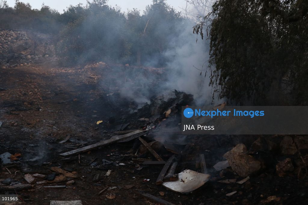 SILWAD, WEST BANK, PALESTINE – OCTOBER 4, 2026: Israeli settlers set fire to olive trees and a car scrap yard between the villages of Ein Yabrud and Silwad, according to the information provided. The owner of the repair shop said more than 50 cars were destroyed in the fire. The incident occurred amid ongoing attacks targeting Palestinian property and agricultural land in the area. Fires affecting olive trees and other Palestinian property have also been reported in areas around Silwad. Photo by Salman Mohsen Alkhatib / JNA Press (Photo by Salman Mohsen Alkhatib/JNA Press via Nexpher Images)