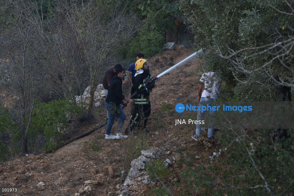 EIN YABRUD, WEST BANK, PALESTINE – OCTOBER 4, 2026: Israeli settlers set fire to olive trees and a car scrap yard between the villages of Ein Yabrud and Silwad, northeast of Ramallah, in the occupied West Bank, on October 4, 2026. The owner of the yard said more than 50 cars were destroyed in the fire. The incident occurred amid ongoing attacks targeting Palestinian property and agricultural land in the area. Fires affecting olive trees and other Palestinian property have also been reported in areas around Silwad. Photo by Salman Mohsen Alkhatib / JNA Press (Photo by Salman Mohsen Alkhatib/JNA Press via Nexpher Images)