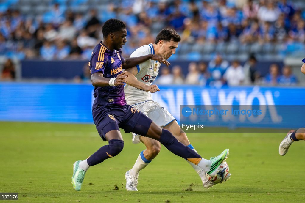 Emiro Garcés #25 of Los Angeles Galaxy and Jose Paradela #20 of Cruz Azul battle for the ball during the friendly football match  between Los Angeles Galaxy and Cruz Azul at Dignity Health Sport Park. on October 4, 2026 in Carson, California. (Photo by Arturo Cordero/ Eyepix Group) (Photo by Arturo Cordero/ Eyepix Group/Eyepix via Nexpher Images)