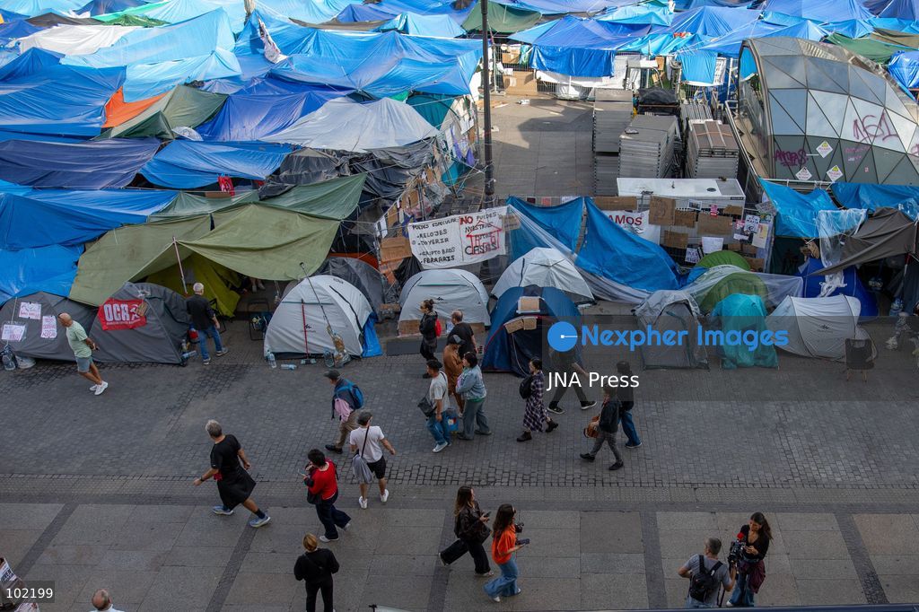 MADRID, SPAIN, OCTOBER 5, 2026: Hundreds of tents remain at Puerta del Sol as housing rights activists continue their protest encampment for a tenth day. The occupation of the central Madrid square began following demonstrations over Spain's housing crisis and the eviction of Maricarmen Abascal, a woman in her eighties whose case became a focal point for protests demanding stronger protections against evictions and greater access to affordable housing. Photo by C. Carvajal / JNA Press. (Photo by C. Carvajal/JNA Press via Nexpher Images)