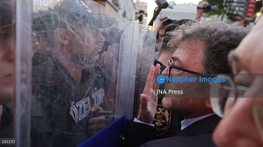 TOP PICS - IZMIR, TURKEY, OCTOBER 5, 2026: Police officers block demonstrators during a protest organized by the Izmir Labor and Democracy Forces on Cyprus Martyrs Street against the transfer of elected mayors to the ruling AKP and amid claims that Izmir Mayor Cemil Tugay could also join the party. After negotiations with police, demonstrators proceeded toward the Turkan Saylan Cultural Center under restrictions on banners and slogans, where the Izmir Bar Association issued a statement criticizing political party defections and their impact on voters' electoral choices. Photo by Turgay Kilic / JNA PRESS (Photo by Turgay Kilic/JNA Press via Nexpher Images)
