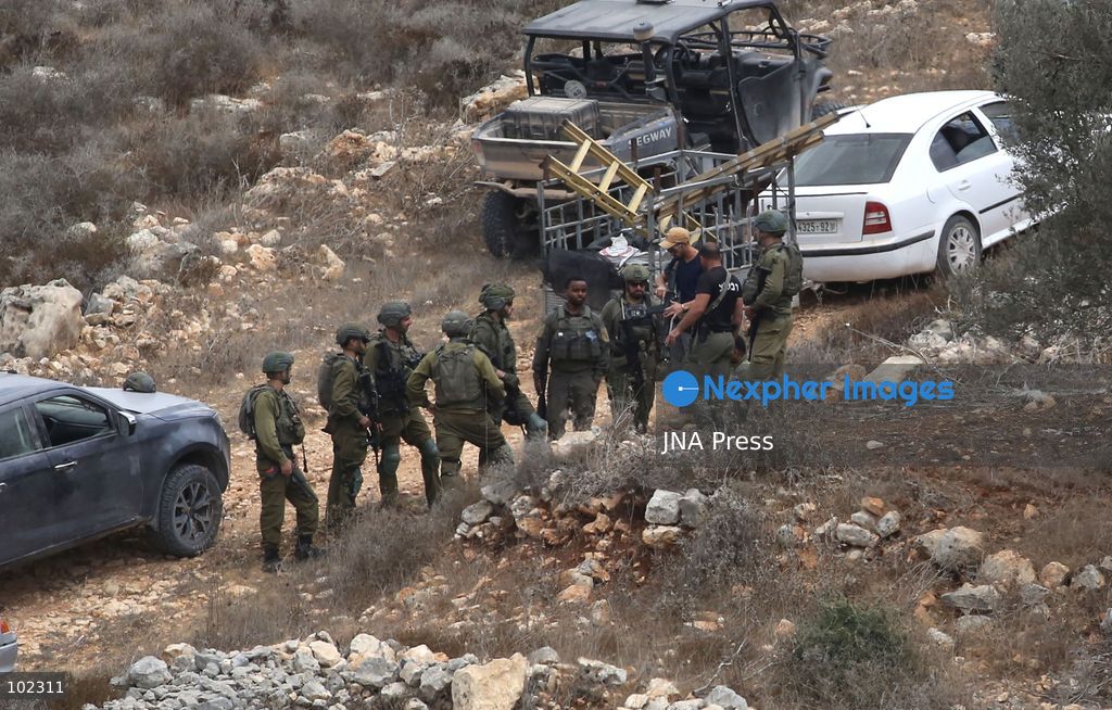 AQRABA, OCCUPIED WEST BANK, OCTOBER 6, 2026: Palestinian farmers come under attack by Israeli settlers while harvesting olives in the village of Aqraba, south of Nablus. Several Palestinians were wounded after settlers opened fire and assaulted farmers during the harvest, according to Palestinian reports. Israeli forces later detained a Palestinian farmer at the scene, according to information provided by the photographer. The Israeli military had not immediately commented on the reported shooting. Photo by Nedal Shtieh/ JNA Press. (Photo by Nedal Shtieh/JNA Press via Nexpher Images)