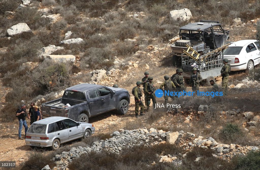 AQRABA, OCCUPIED WEST BANK, OCTOBER 6, 2026: Palestinian farmers come under attack by Israeli settlers while harvesting olives in the village of Aqraba, south of Nablus. Several Palestinians were wounded after settlers opened fire and assaulted farmers during the harvest, according to Palestinian reports. Israeli forces later detained a Palestinian farmer at the scene, according to information provided by the photographer. The Israeli military had not immediately commented on the reported shooting. Photo by Nedal Shtieh/ JNA Press. (Photo by Nedal Shtieh/JNA Press via Nexpher Images)