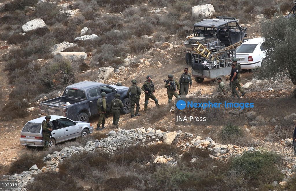 AQRABA, OCCUPIED WEST BANK, OCTOBER 6, 2026: Palestinian farmers come under attack by Israeli settlers while harvesting olives in the village of Aqraba, south of Nablus. Several Palestinians were wounded after settlers opened fire and assaulted farmers during the harvest, according to Palestinian reports. Israeli forces later detained a Palestinian farmer at the scene, according to information provided by the photographer. The Israeli military had not immediately commented on the reported shooting. Photo by Nedal Shtieh/ JNA Press. (Photo by Nedal Shtieh/JNA Press via Nexpher Images)