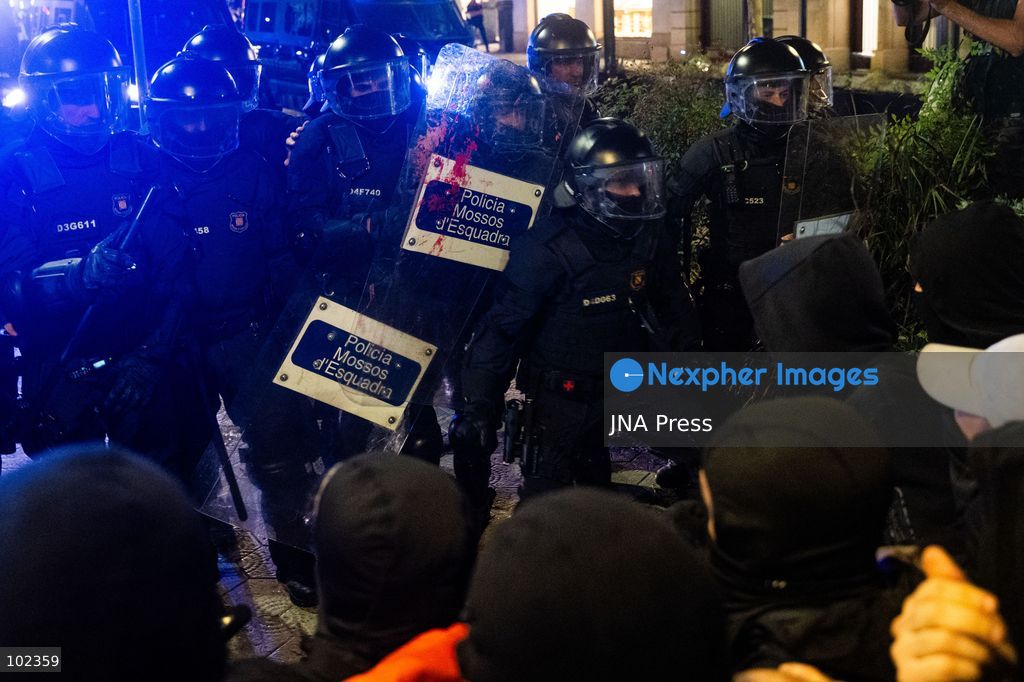 BARCELONA, SPAIN, OCTOBER 5, 2026: Demonstrators clash with riot police in central Barcelona following a mass protest over the city’s housing crisis. Groups threw objects at officers and set up burning barricades after the main demonstration ended, prompting Mossos d’Esquadra riot police to charge and disperse crowds around Passeig de Gracia, Placa de Catalunya and nearby streets. Around 20,000 people attended the earlier housing demonstration according to Barcelona police, while organizers estimated 120,000, calling for action over rising rents, evictions and housing affordability. Photo by Marc Asensio Clupés / JNA Press (Photo by Marc Asensio Clupes/JNA Press via Nexpher Images)