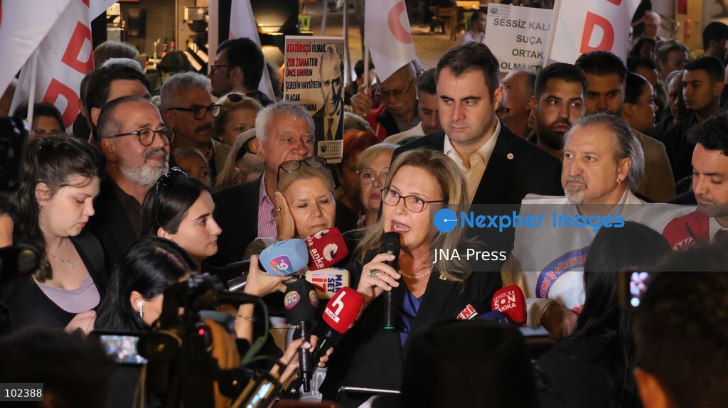 IZMIR, TURKEY, OCTOBER 5, 2026: Protesters gather outside the Turkan Saylan Cultural Center in Izmir to oppose reports that Izmir Metropolitan Mayor Cemil Tugay could join President Recep Tayyip Erdogan's ruling AKP. Trade unions, professional organizations, political groups and civil society representatives joined the demonstration after police prevented participants from holding a planned march in Konak. Tugay resigned from the CHP in June and has since served as an independent mayor. Protesters called on him to resign rather than change his political affiliation while remaining in office. Photo by Turgay Kilic / JNA PRESS (Photo by Turgay Kilic/JNA Press via Nexpher Images)