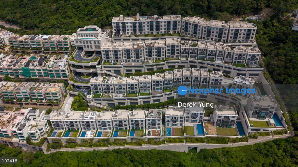 An aerial photograph showing residential building at ONE STANLEY on October 4, 2026 in Hong Kong. ONE STANLEY is a low-density luxury residential project developed by K&K Property Holdings Limited, local media reported that it is recently suspected of improper steel reinforcement works at a house. (Photo by Derek Yung/Nexpher Images)