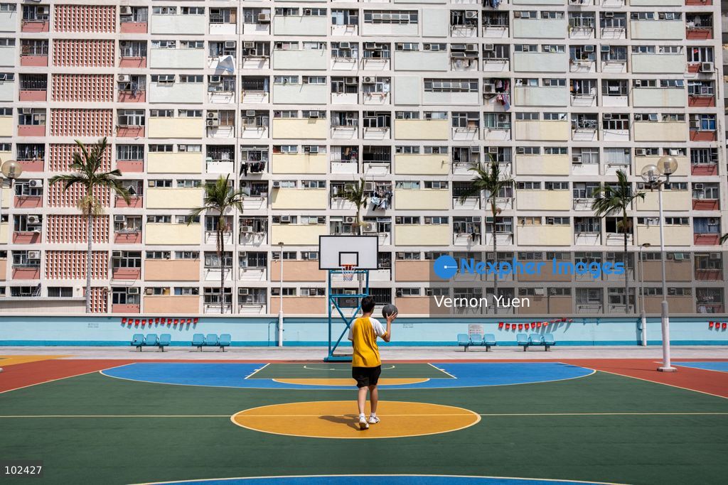 A boy playing basketball at Choi Hung Estate on October 7, 2026 in Hong Kong. (Photo by Vernon Yuen/Nexpher Images)
