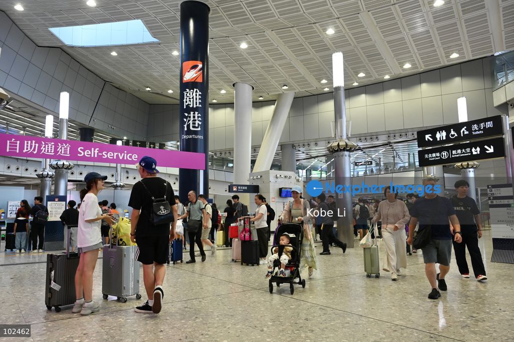 Chinese tourists are getting ready to take the high-speed train from Hong Kong West Kowloon Station on October 7, 2026 in Hong Kong. Today is the last day of China's National Day holiday. (Photo by Kobe Li/Nexpher Images)